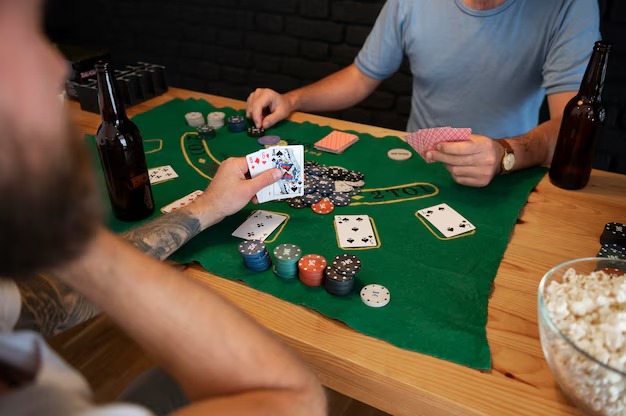 Capsa Susun card arrangement interface showing back, middle, and front hands
